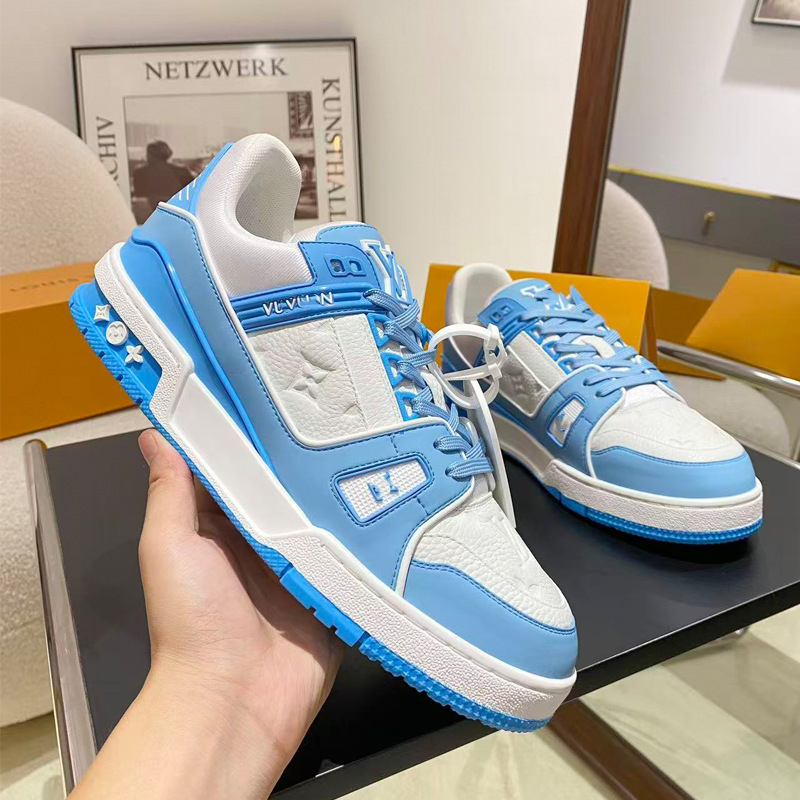 Zapatos de moda europeos Guangzhou de alta versión驴 entrenador zapatos deportivos ociosos de cuero universal para hombres y mujeres