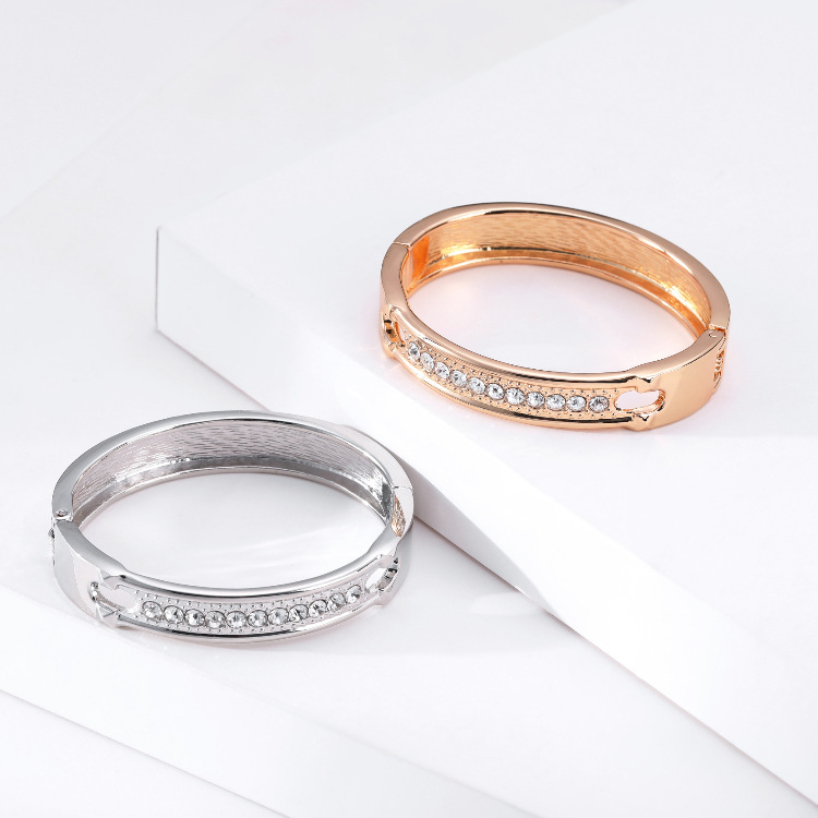Fashion glossy hollow diamond spring alloy open bracelet wholesale