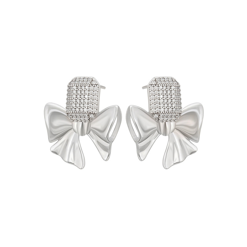 Xuping micro gemas artificiales aleación de cobre chapado arco blanco pernos de arco simple elegante temperamento auriculares al por mayor mujeres