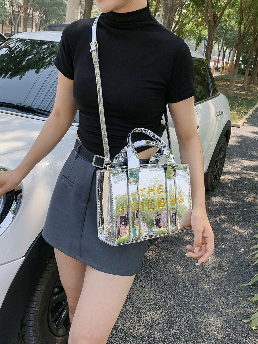 Bolso de mano estilo nuevo transfronterizo para mujer 2025, bolso de hombro y bandolera de moda europea y americana de cuero charol con letras en relieve
