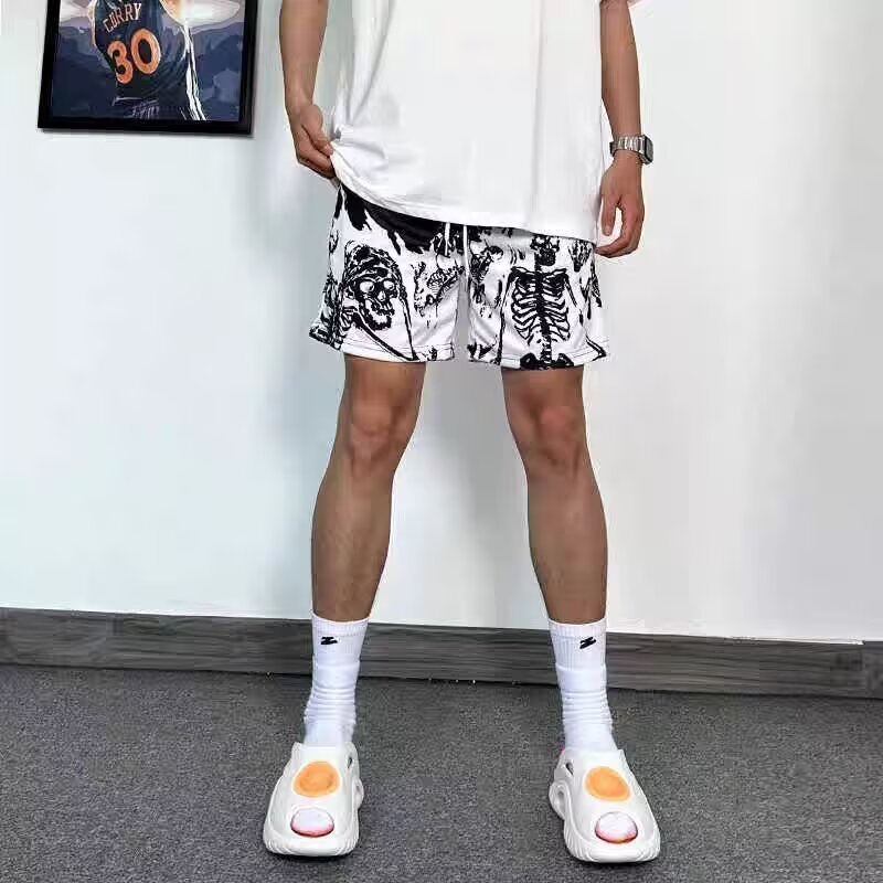 Explosiones transfronterizas al por mayor pantalones cortos de malla de hielo pareja suelta de chicos con pantalones de baloncesto de 3 puntos de verano