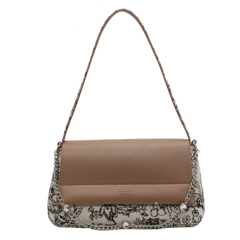 Diseño coreano de nicho simple bolso de hombro de color contraste para mujeres verano 2026 nuevo estilo diario bordado bolso de viaje al trabajo