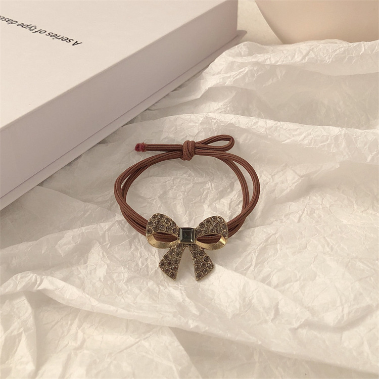 Retro aleación de diamante arco toque de cabello cuerdas de goma anillo de cabello de alta elasticidad y duradera toque de cabello