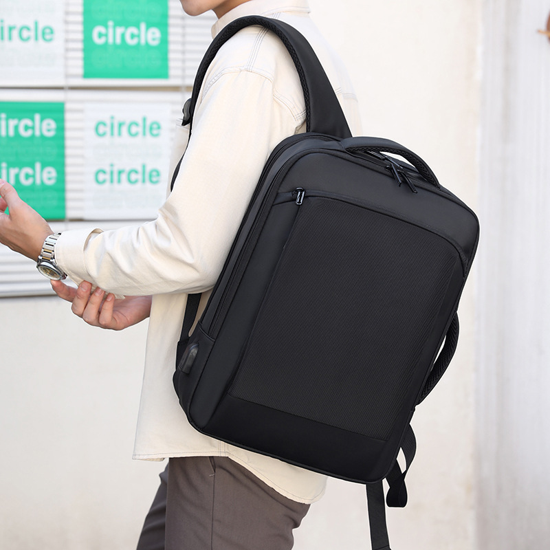 Nueva mochila de negocios simple transfronteriza versátil bolsa de computadora portátil de viaje multi-capas para hombres bolso USB