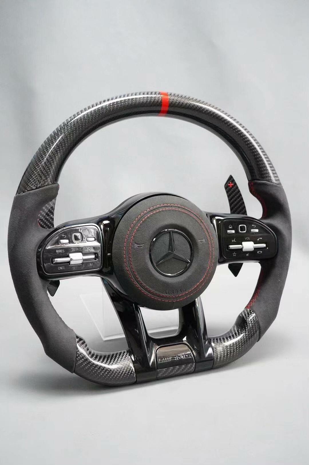 Suitable for Mercedes-Benz older models, this is a new AMG carbon fiber steering wheel with an alcantara suede finish, designed for the A-Class and E-Class models