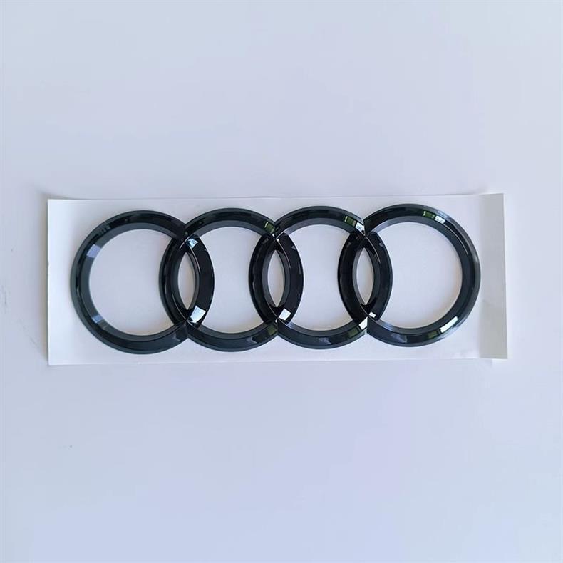 Audi A4L modified with RS4 black emblems, S3 four-ring front emblems, Sline side emblems, and S4 sport rear emblems, all made with original factory materials