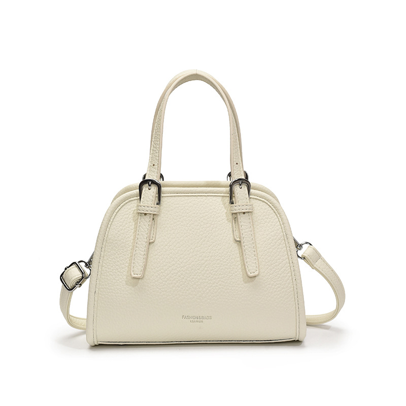 Bolsos populares de este año 2025 primavera y verano nuevo bolso femenino casual con patrón de lichi bolso de hombro simple bolso de mensajero de viaje