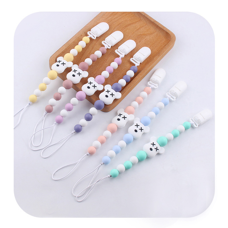 Nuevos artículos para bebés de dibujos animados violentos oso silicona calmar cadena de tetas para bebés palillos cadena de tetas anti-caída cadena