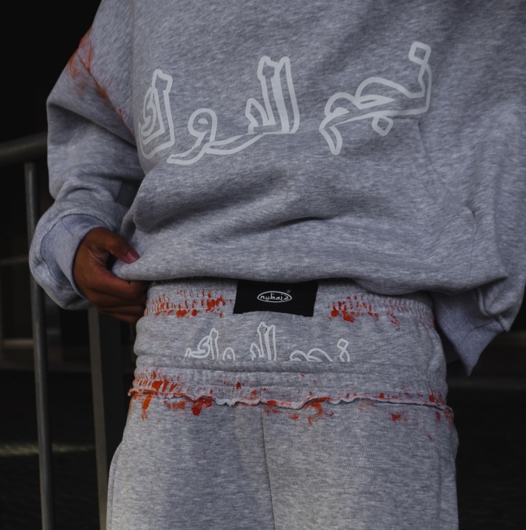 Europa y Estados Unidos explotaron transfronterizos personales calle gris impresión pantalones casuales sueltos de doble cintura pantalones con sudadera con capuz