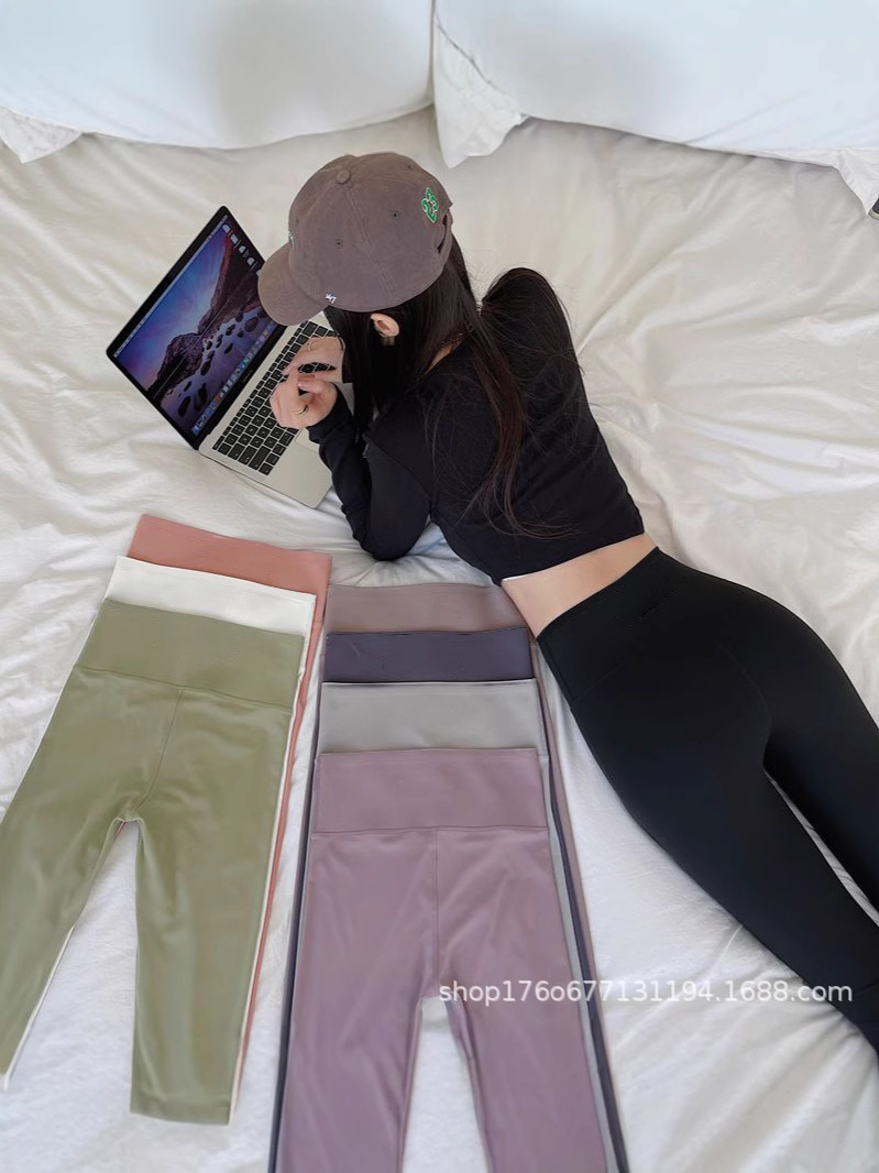 Pantalones de tiburón de nueve puntos de explosión transfronteriza primavera y otoño vestimenta exterior de mujer abdominal de elevación de cadera de acondicionamiento físico pantalones de tiburón