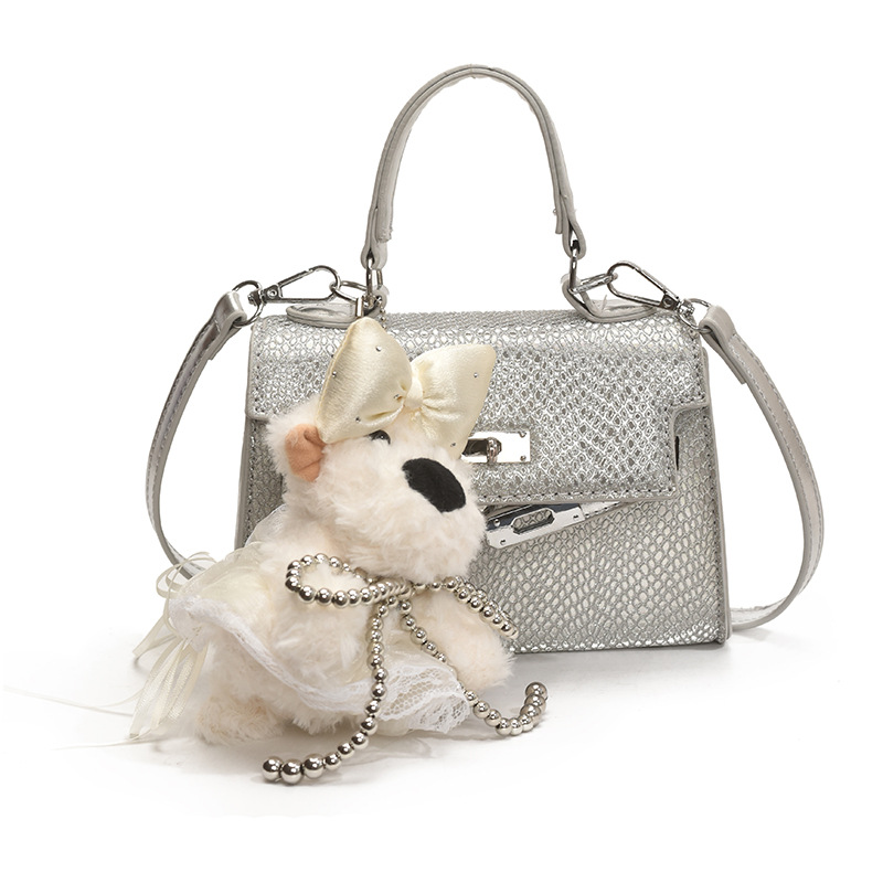 Bolso Kelly portátil de alta gama de moda transfronteriza para mujer 2025 nuevo estilo salvaje estilo occidental color sólido bolso de mensajero casual de un solo hombro