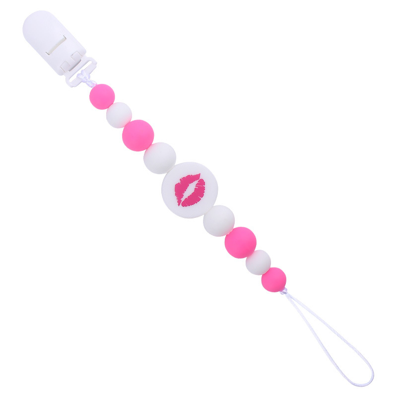 Nuevo bebé suministros de dibujos animados de impresión redonda amor creativo DIY silicona mordedura molar pezón cadena anti-caída