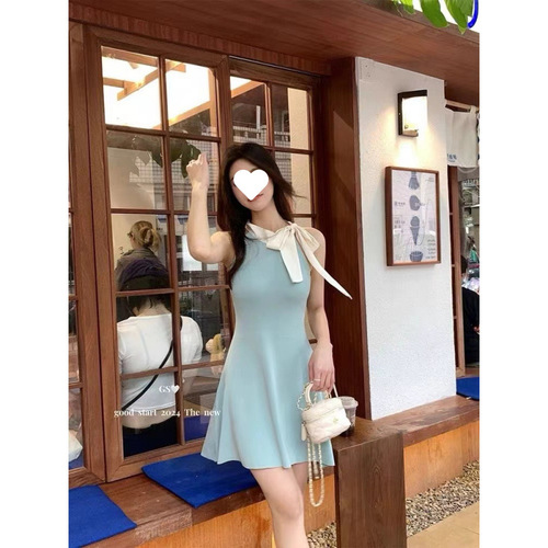Bow-knot backless halter-neck knitted dress for women: summer, figure-flattering, edgy design, sleeveless, and chic mini skirt for outerwear