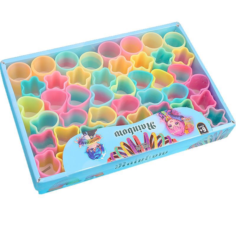 Heart-shaped magic rainbow ring mini spring ring telescopic stacking elastic ring to push hot selling small toys gifts wholesale