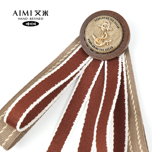 Lapel blouse with a British academic style, coffee brown color, featuring a vintage butterfly bow tie, collar flowers, and a pin accessory.