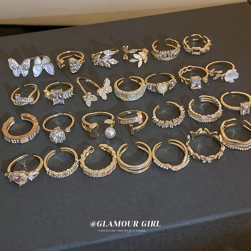 Oro real galvanizado ZIRCON diamante incrustado anillo abierto luz lujo nicho moda dedo índice anillo Internet celebridad todo partido pulsera al por mayor