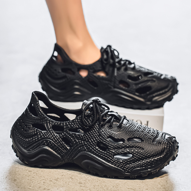 Comercio exterior transfronterizo zapatos con agujeros para hombres 2025 nueva playa moda de verano sandalias zapatillas zapatos de cabeza al por mayor