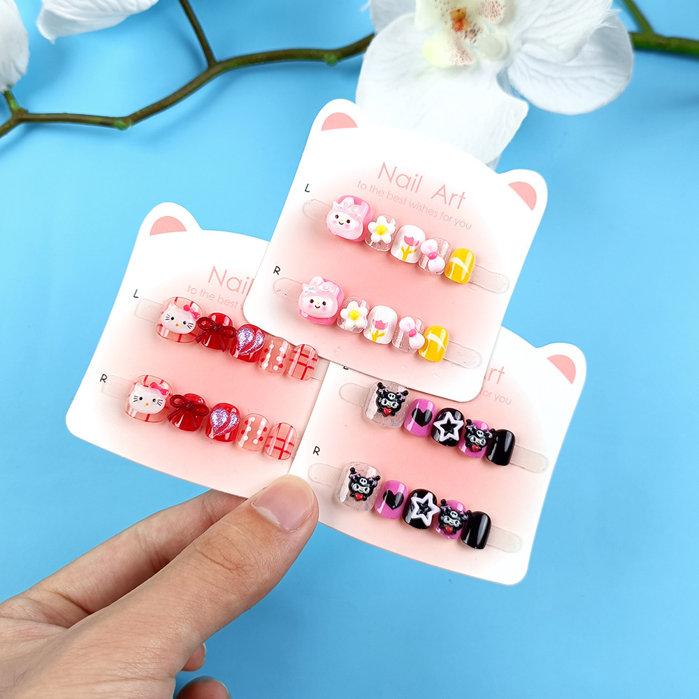Punto de perforación diez piezas de papel de cartón de manicura gato arco de mariposa niños que usan uñas dibujos animados adorables parches de uñas para niños