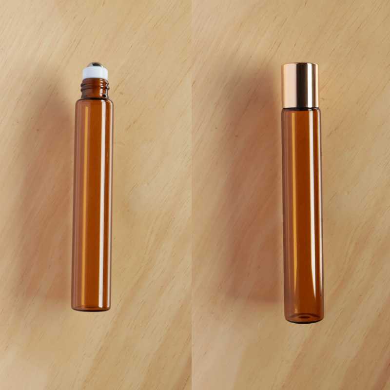 Botella roll-on para aceites esenciales cosméticos, botella marrón para aceites esenciales, botella transparente para reactivos, botella roll-on de vidrio, botella de perfume ámbar.