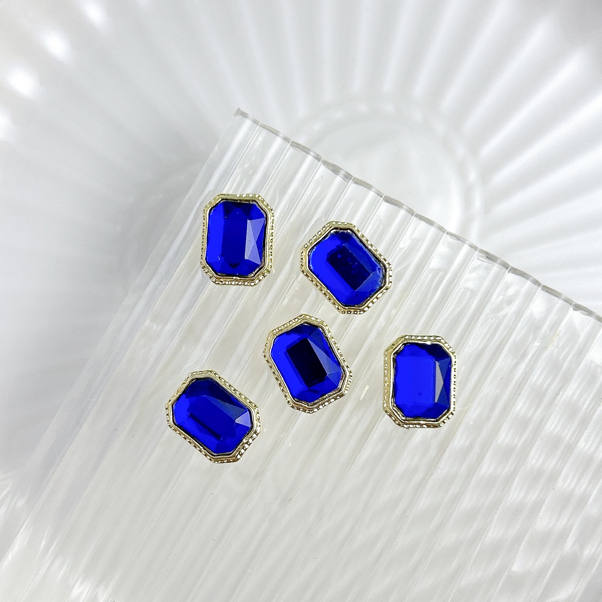 Nueva aleación china joyas de manicura taladro explosión grasa flash Fang amor gota de agua XiFeiYuan la misma armadura de la corte con taladro