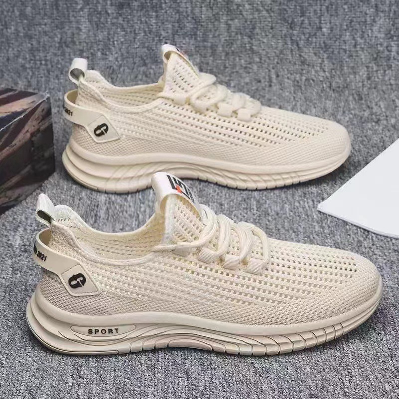Otoño nuevo tipo de zapatos de hombre transpirables delgados estilo coreano de moda con zapatos casuales un pie de calzado vacío zapatos deportivos tejidos al por mayor
