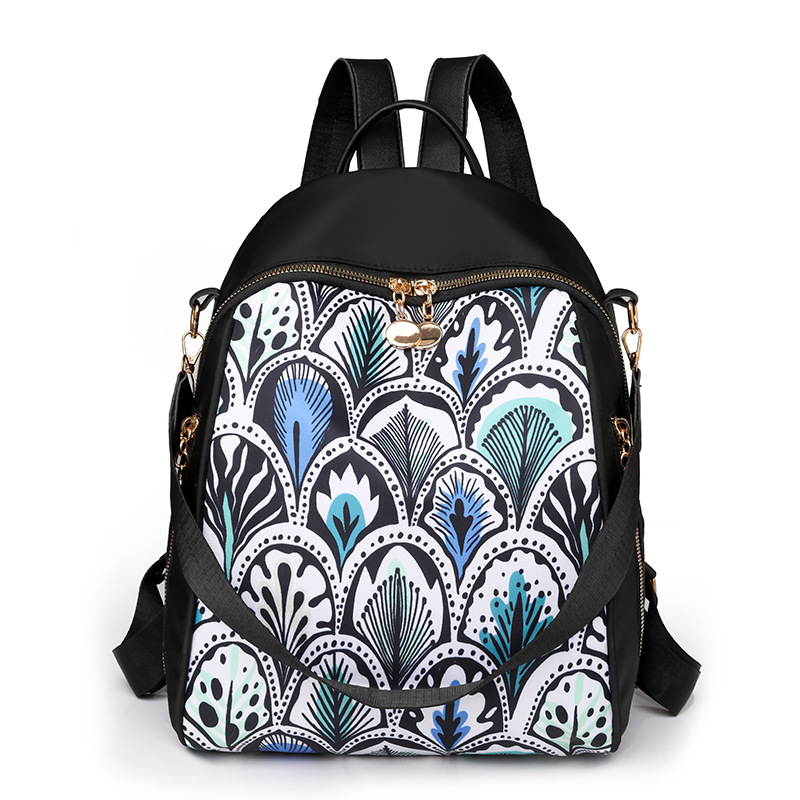 Bolsos para mujer 2023 nueva mochila de nylon para mujer coreana moda salvaje color de contraste mochila de viaje al aire libre al por mayor