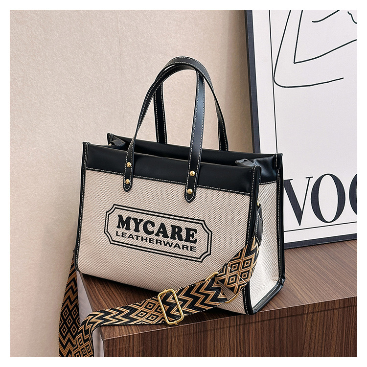 Bolso tote de gran capacidad, bolso de mano para clase y viajes, el popular bolso bandolera con estampado de letras de moda de este año.
