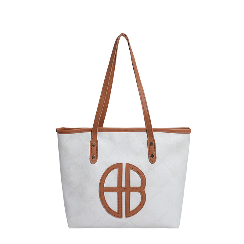 Colores contrastantes empalmados bolsos de gran capacidad para mujeres 2025 nuevo retro versátil viaje bolsos de hombro bolsos de moda debajo de la axila