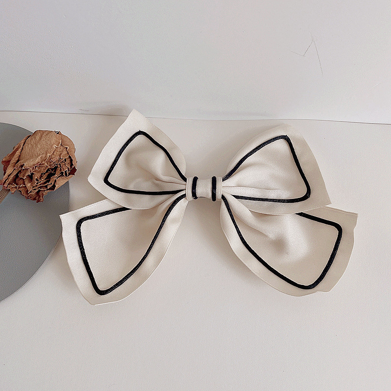 Fashion Retro Bow Simple Contrast Color Hairpin display picture 4