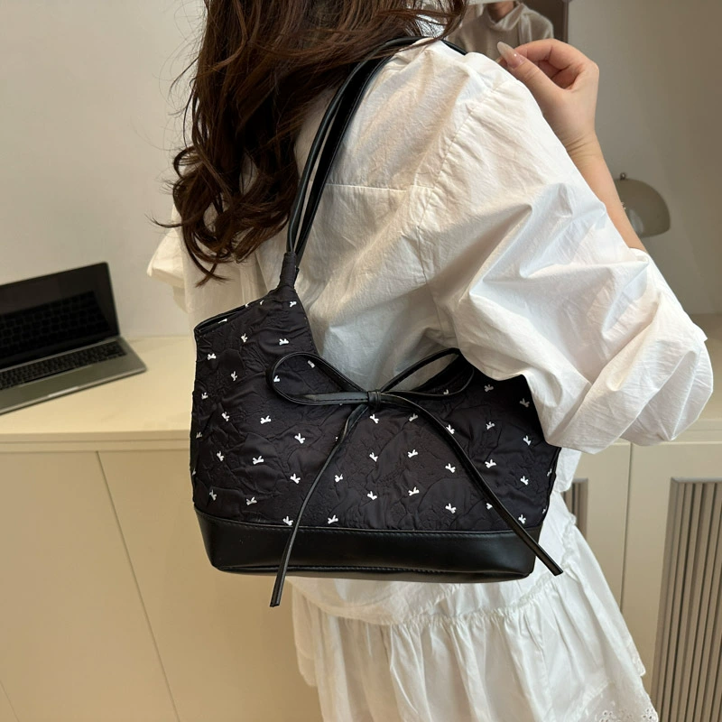 Universal capacious one-shoulder bag with bow