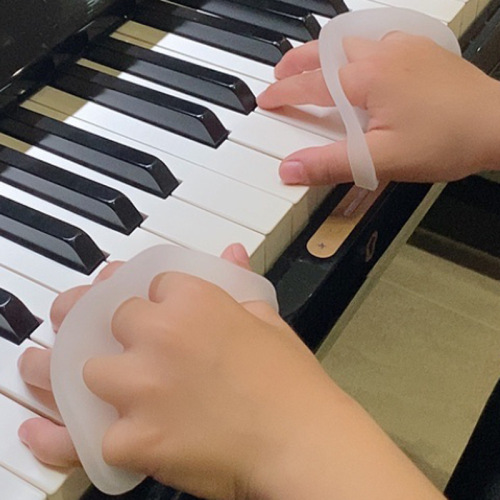 Wholesale silicone piano practice device, piano training device, piano finger forcer, children's piano hand corrector