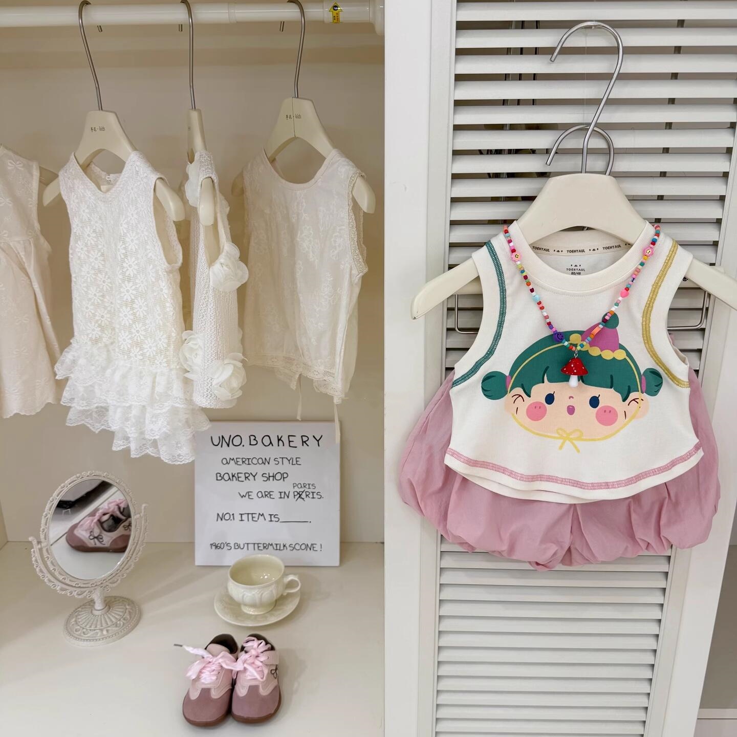 Xianning siete ropa para niños verano niñas chaleco de algodón 2025 nuevo verano niños dulce y fresco dibujos animados camiseta sin mangas marea