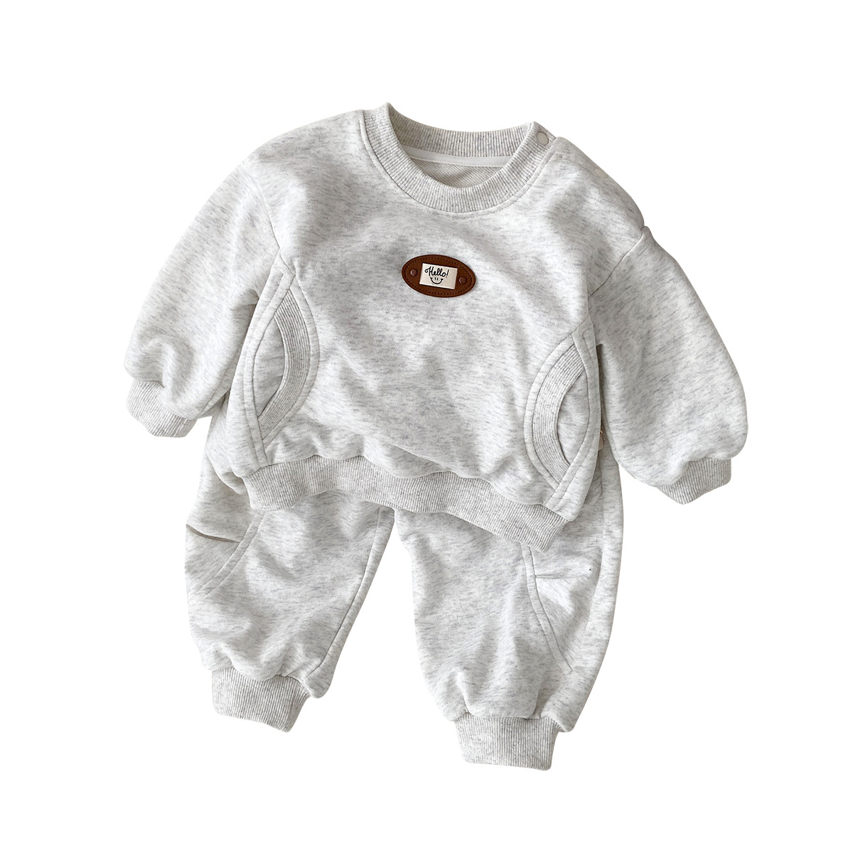 2025 nuevo traje de primavera para niños y niños primavera nuevo traje de suéter de bolsillo de costura de estilo coreano para niños