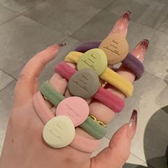 韓国版の小さい清新な衝突色のかわいい合金のボタンのシュシュの高弾力のカラーのタオルの輪の団子のひもの皮の筋の女性