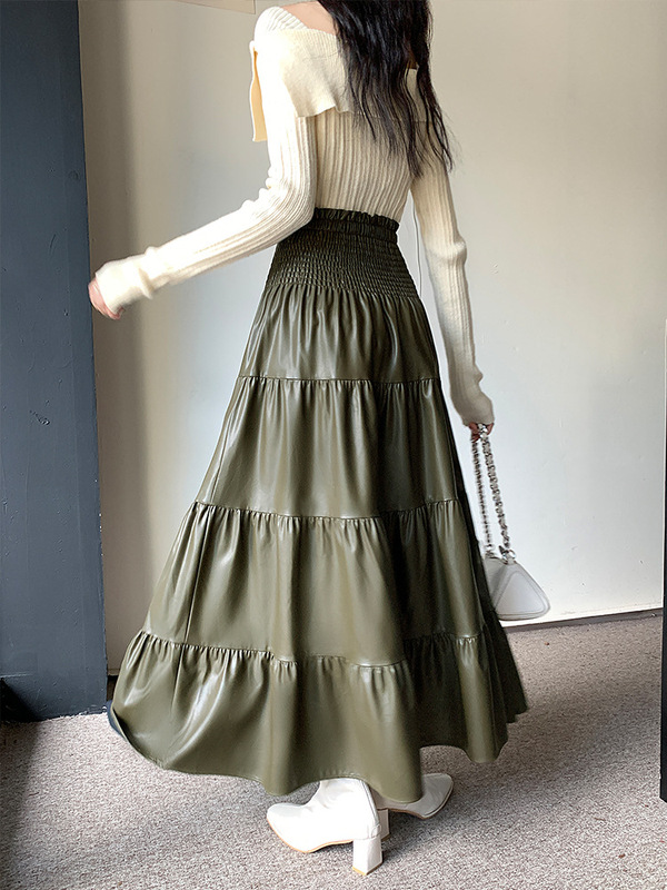ファッションの気質は腰を緩めて重工業のしわのpu皮のスカートの女性の秋冬の新型の高い腰の中の長い半身のスカートをつなぎ合わせます。|undefined