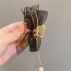 Чёрный с лентой и бахромой