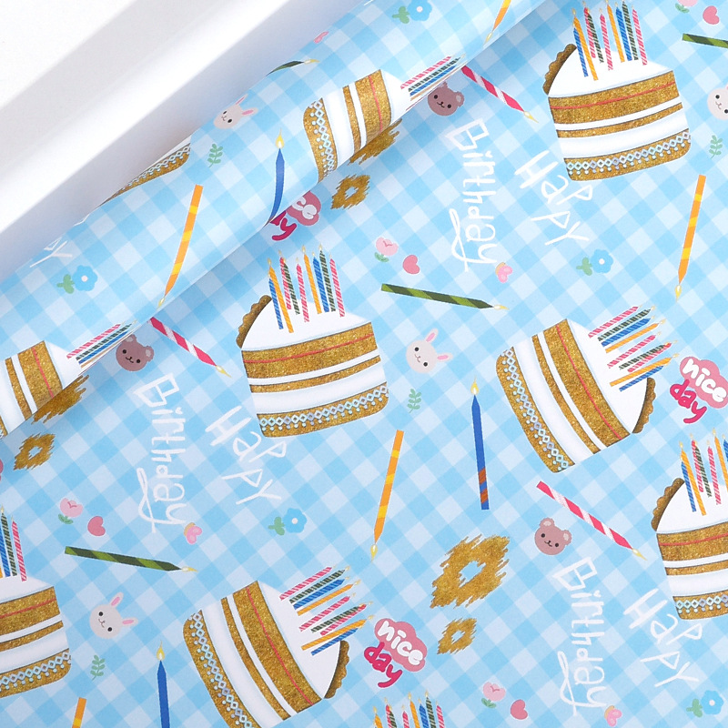 Nuevo producto transfronterizo Papel de embalaje de regalo del día del niño Papel de embalaje de regalo de feliz cumpleaños Papel de embalaje de juguete lindo de dibujos animados