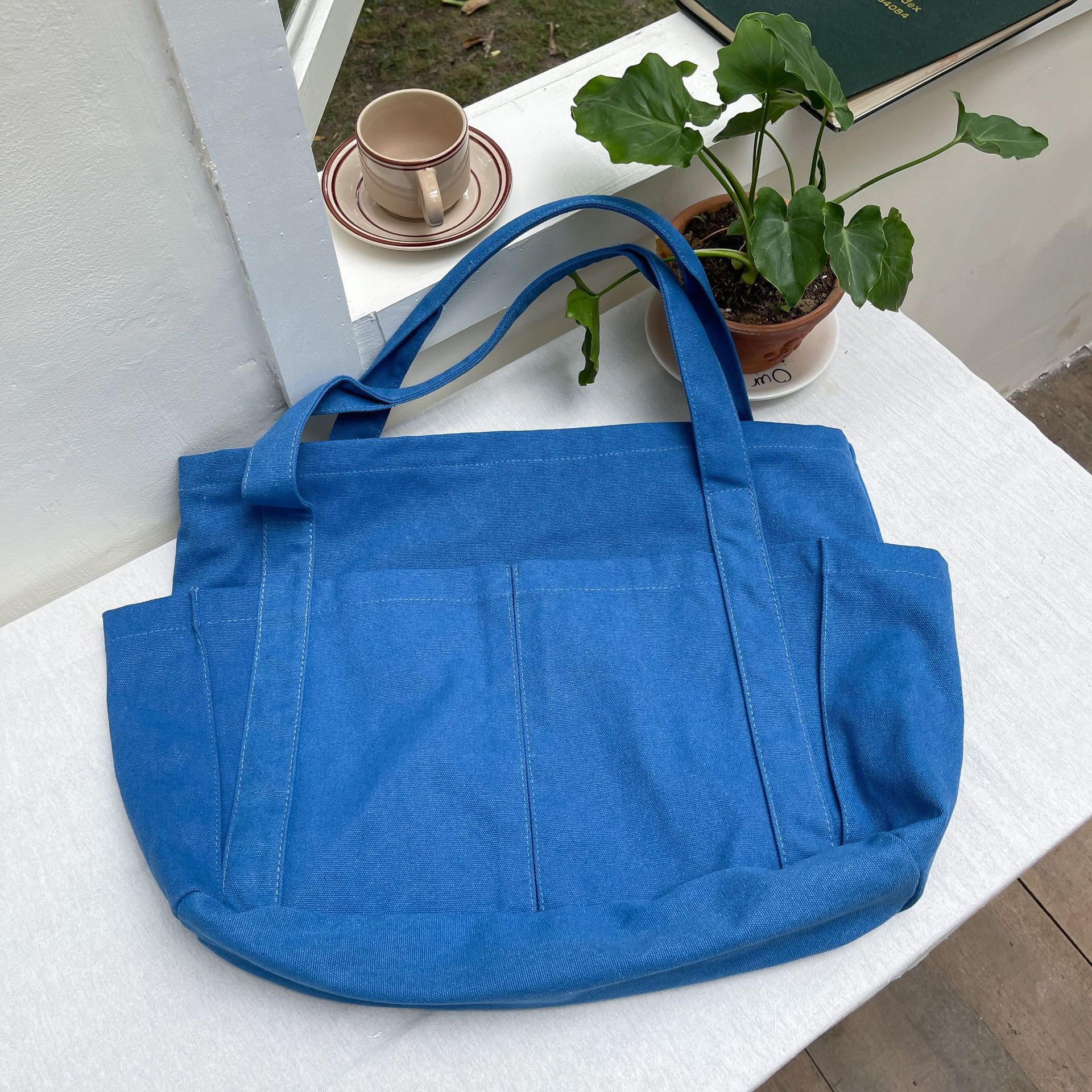 Estilo coreano casual color sólido Internet celebridad moda bolsa de tela simple moda de gran capacidad todo fósforo de las mujeres solo hombro bolsa de lona