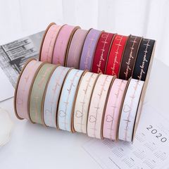 Flower wrapping ribbon factory wholesale Valentine's Day gift cake baking flowers packaging materials heart-stirring hot stamping threaded ribbon