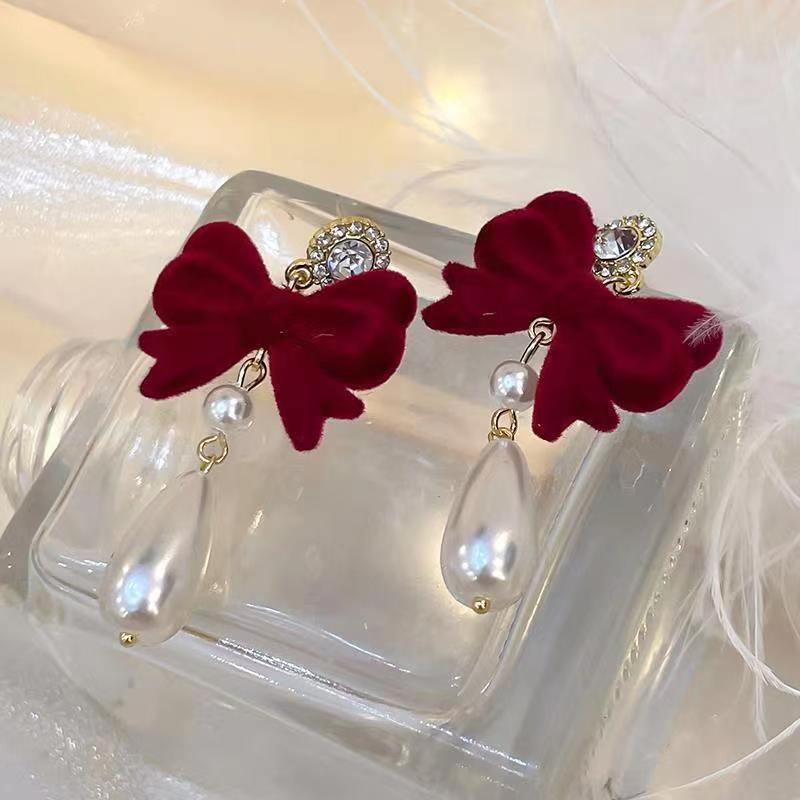 Retro elegant burgundy earrings with bow