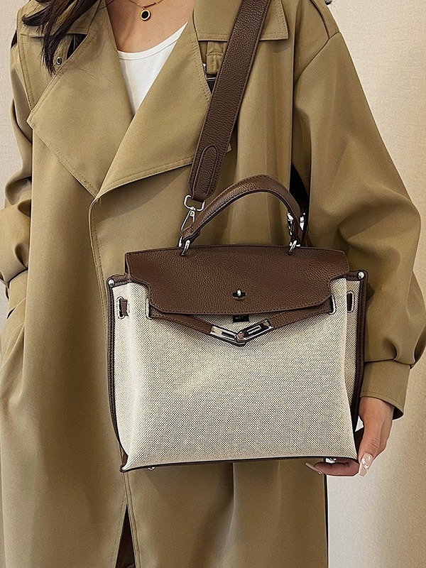 Bolsa de mano transfronteriza para mujeres 2026 nueva tela de lino empalmada color de textura de viaje mochila de hombro