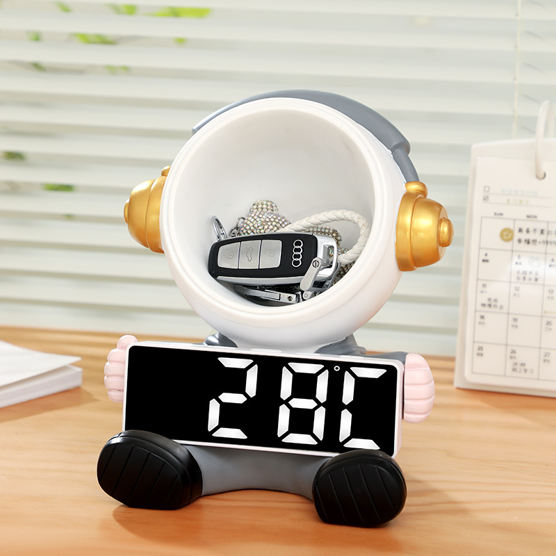 Reloj de astronauta adornos de sala de estar dormitorio lujo ligero reloj de escritorio tipo reloj electrónico decoración despertador