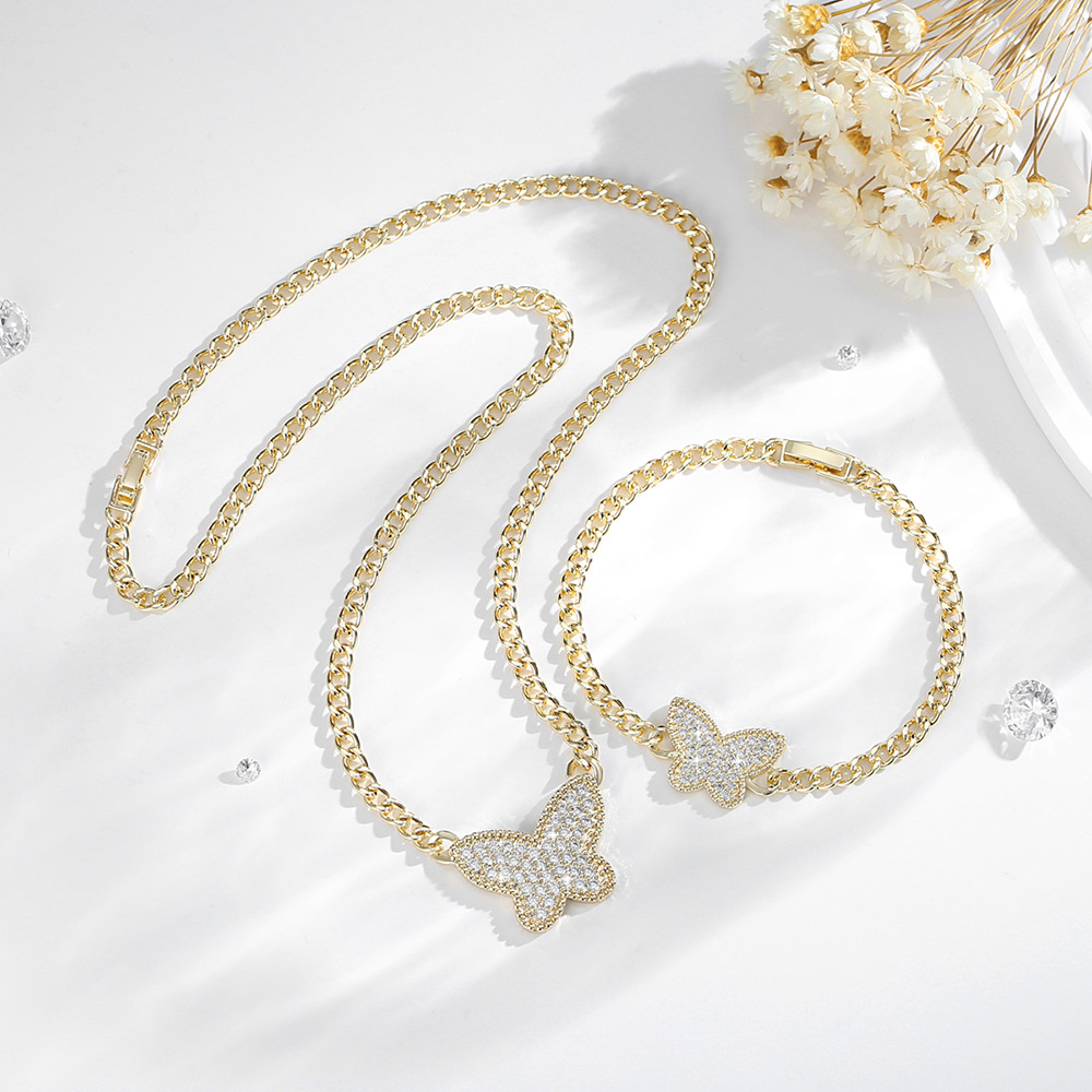 Explosiones transfronterizas de venta caliente pulsera mariposa O-chaîne conjunto de joyas de cobre 14K oro chapado collar de joyas al por mayor