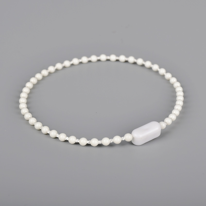 Lanris accesorios de cortina de calidad de exportación Blanco tire Bead roller Shutter accesorios de cortina romana 4,5 tire del cordón de una sola pieza hebilla de cuentas