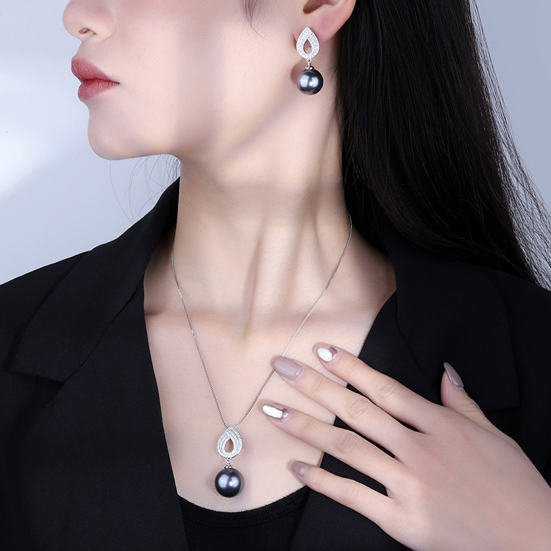 Zhuang Sheng joyería de cobre inferior chapado en oro con incrustaciones de perlas de moda coreana gris perla traje 14mm al por mayor