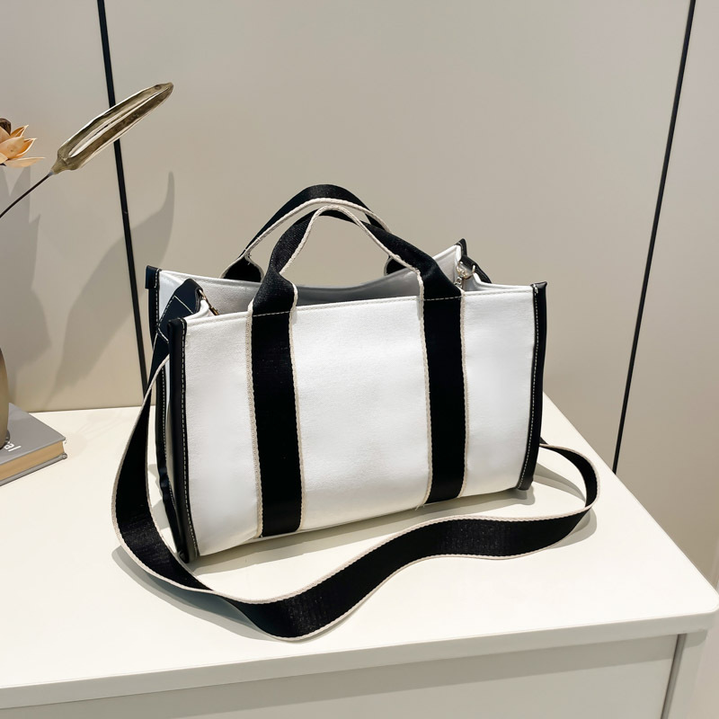 2024 invierno nuevo estilo de moda bolsa de lona coreana bolso de mano de gran capacidad para mujeres de viaje de hombro mochila