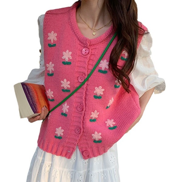 Cute fuchsia knitted vest flower-shaped