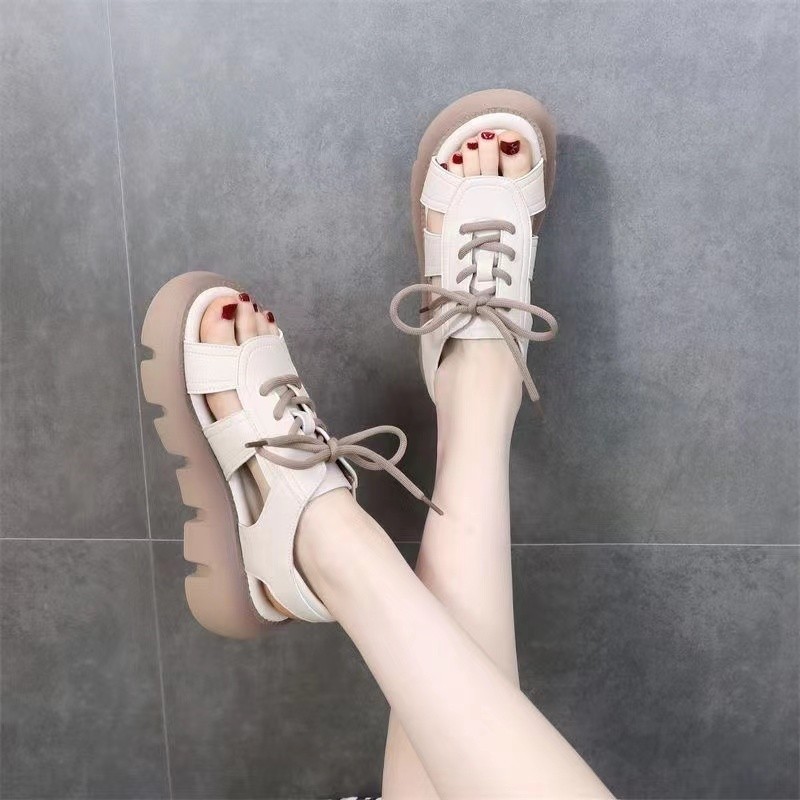 Sandalias de suela gruesa para mujeres verano 2026 nueva moda casual cordón muffin zapatos de playa romanos huecos