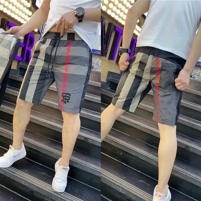 Spring and Summer 2020 new Hong Kong style shorts color matching simple printed wide leg sports casual shorts beach pants for men