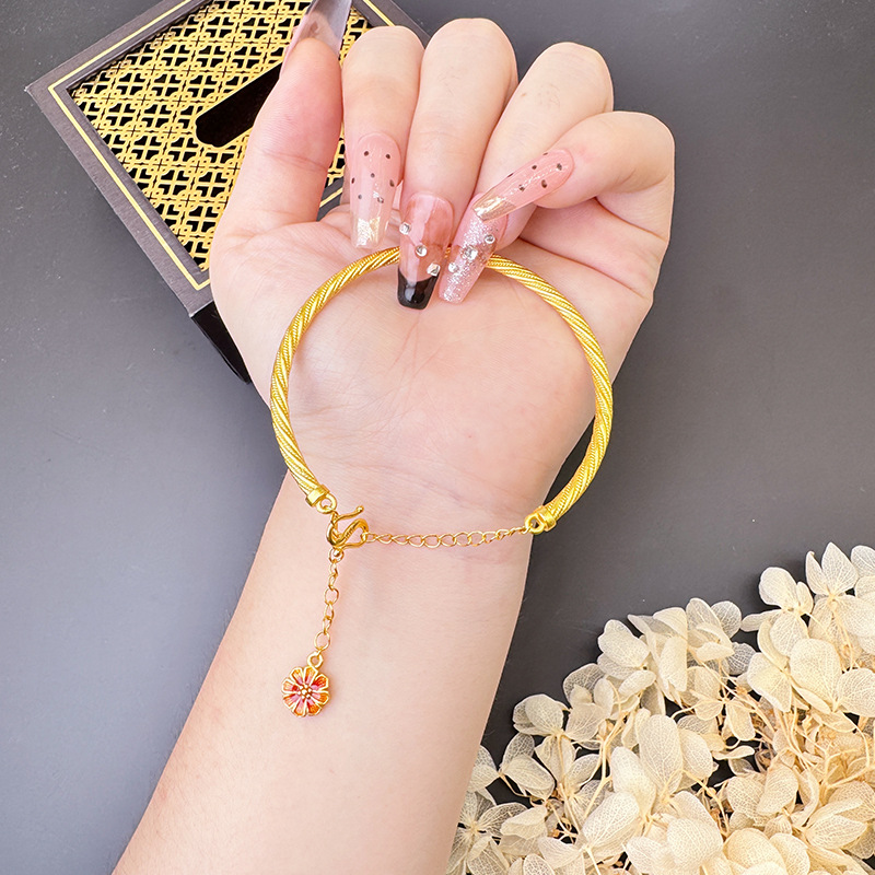 Vietnam Shajin Gesang Flower Series Pendientes Collar Anillo Temperamento simple Pulsera Twist Juego de cuatro piezas de imitación de oro